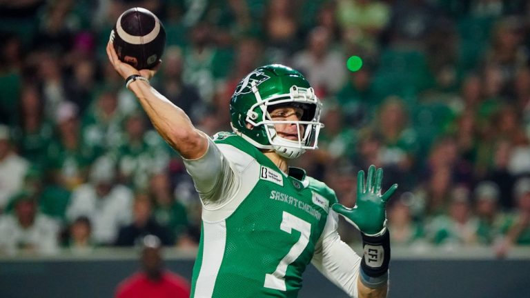 Saskatchewan Roughriders quarterback Trevor Harris (7) throws against the Montreal Alouettes during the second half of CFL football action in Regina, on Friday, August 16, 2024. (Heywood Yu/CP)