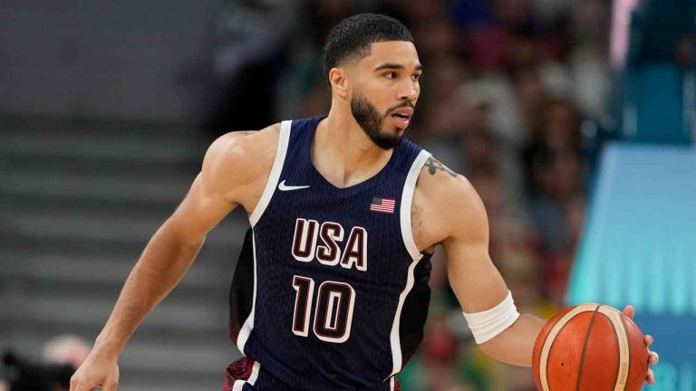 United States' Jayson Tatum dribbles during a men's basketball game against Puerto Rico at the 2024 Summer Olympics. (Michael Conroy/AP)