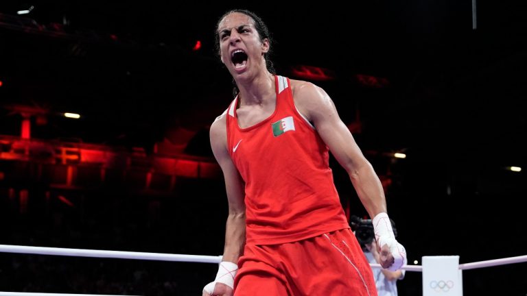 Algeria's Imane Khelif celebrates after defeating Hungary's Anna Hamori in their women's 66kg quarterfinal boxing match at the 2024 Summer Olympics, Saturday, Aug. 3, 2024, in Paris, France. (John Locher/AP Photo)