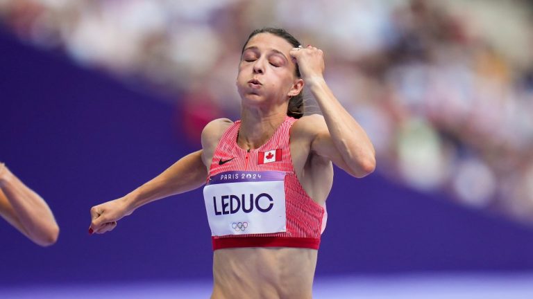 Audrey Leduc, of Canada, wins a heat in the women's 100-meter run at the 2024 Summer Olympics, Friday, Aug. 2, 2024, in Saint-Denis, France. (Petr David Josek/AP Photo)