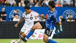 CF Montreal defender Fernando Álvarez (4) moves in on Toronto FC's Jahkeele Marshall-Rutty (7) during second half MLS soccer action in Montreal, Saturday, July 20, 2024. (Graham Hughes/CP)