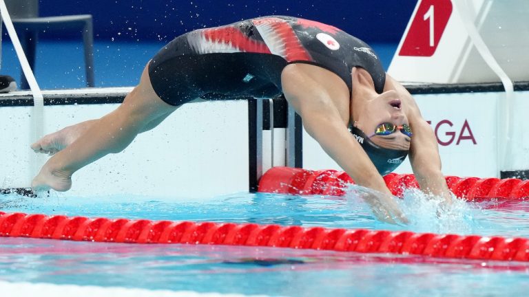 Canada's Kylie Masse competes during the 100m women's backstroke final at the 2024 Summer Olympics in Paris, Tuesday, July 30, 2024. (Nathan Denette/THE CANADIAN PRESS)