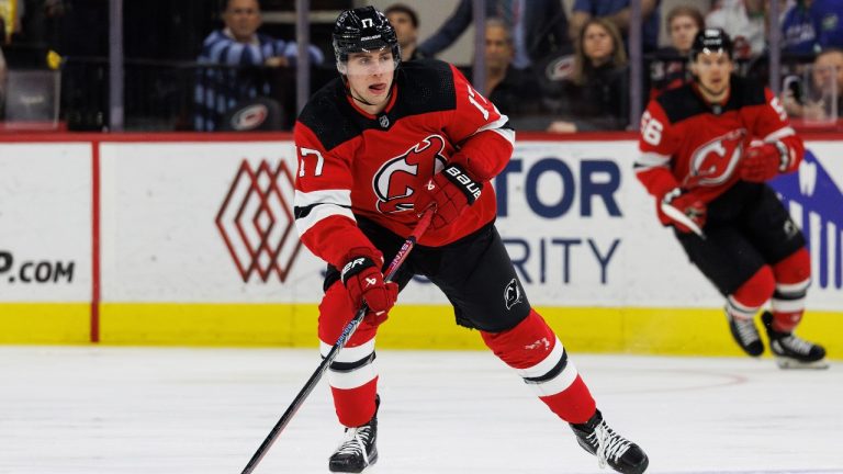 New Jersey Devils' Simon Nemec (17) handles the puck during an NHL hockey game in Raleigh, N.C., Saturday, Feb. 10, 2024. (Ben McKeown/AP Photo)