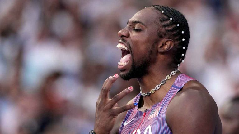 Noah Lyles, of the United States, reacts ahead of his men's 100-meters semifinal at the 2024 Summer Olympics. (Bernat Armangue/AP)