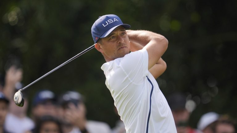 Xander Schauffele, of the United States, plays his shot on the 5th tee during the second round of the men's golf event at the 2024 Summer Olympics, Friday, Aug. 2, 2024, at Le Golf National in Saint-Quentin-en-Yvelines, France. (George Walker IV/AP Photo)