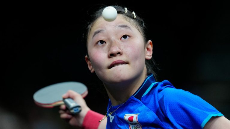 Japan's Miwa Harimoto plays against Germany's Xiaona Shan during the women's teams semifinal table tennis match at the 2024 Summer Olympics, Thursday, Aug. 8, 2024, in Paris, France. (Petros Giannakouris/AP Photo)