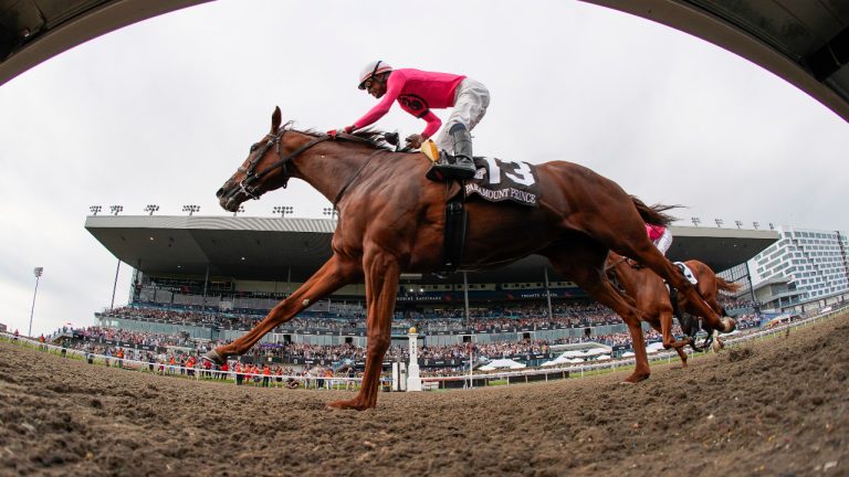 Paramount Prince, with Patrick Husbands aboard, crosses the finish line to win the 164th running of the Kings's Plate horse race in Toronto, Sunday, Aug. 20, 2023. (Mark Blinch/CP)