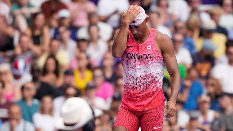 Damian Warner, of Canada, reacts during the decathlon pole vault at the 2024 Summer Olympics, Saturday, Aug. 3, 2024, in Saint-Denis, France. (Bernat Armangue/AP Photo)