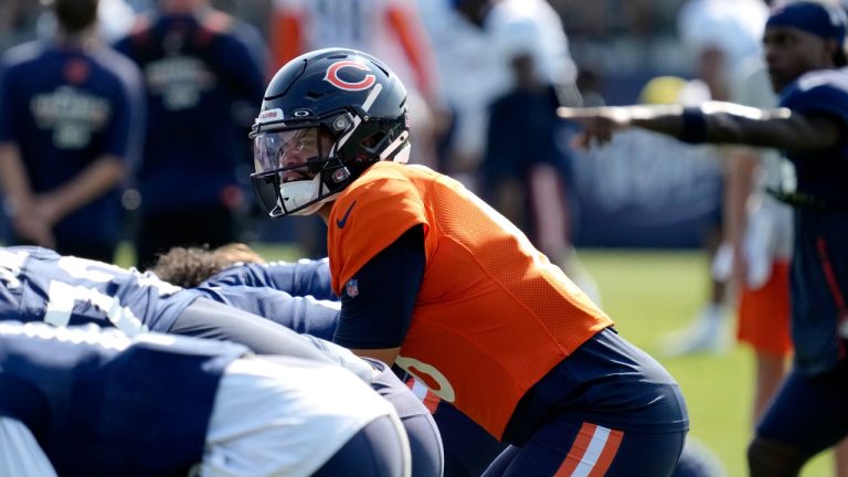 Chicago Bears quarterback Caleb Williams works with teammates during an NFL football training camp practice in Lake Forest, Ill., Thursday, Aug. 8, 2024. (Nam Y. Huh/AP)