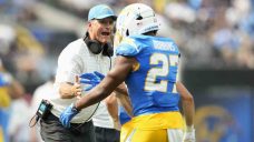 Dobbins rushes for 135 yards, Chargers beat Raiders in Jim Harbaugh&#8217;s debut