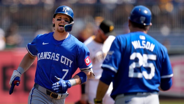 Kansas City Royals' Bobby Witt Jr. (7) rounds third to greetings from third base coach Vance Wilson (25) after hitting a solo home run off Pittsburgh Pirates starting pitcher Mitch Keller during the first inning of a baseball game in Pittsburgh, Saturday, Sept. 14, 2024. (AP/Gene J. Puskar)