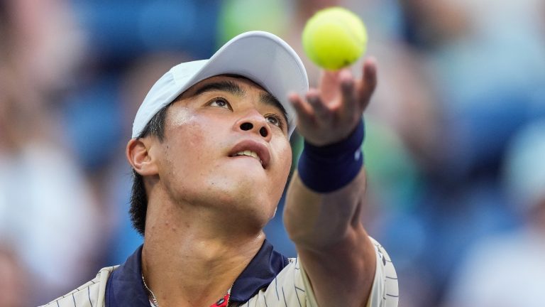 Brandon Nakashima, of the United States, serves to Alexander Zverev of Germany, during the fourth round of the U.S. Open tennis championships, Sunday, Sept. 1, 2024, in New York. (AP/Eduardo Munoz Alvarez)