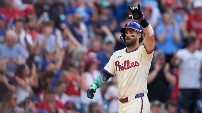 Philadelphia Phillies' Bryce Harper reacts after hitting a two-run home run off New York Mets' Luis Severino during the sixth inning of a baseball game, Saturday, Sept. 14, 2024, in Philadelphia. (AP Photo/Derik Hamilton)