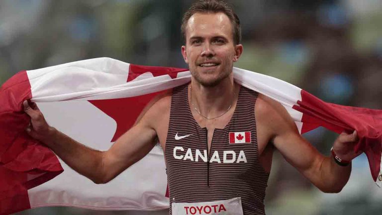 Canada's Nate Riech celebrates after winning the men's T38 1500-meters final at Tokyo 2020 Paralympic Games, Saturday, Sept. 4, 2021, in Tokyo, Japan. (Emilio Morenatti/AP)