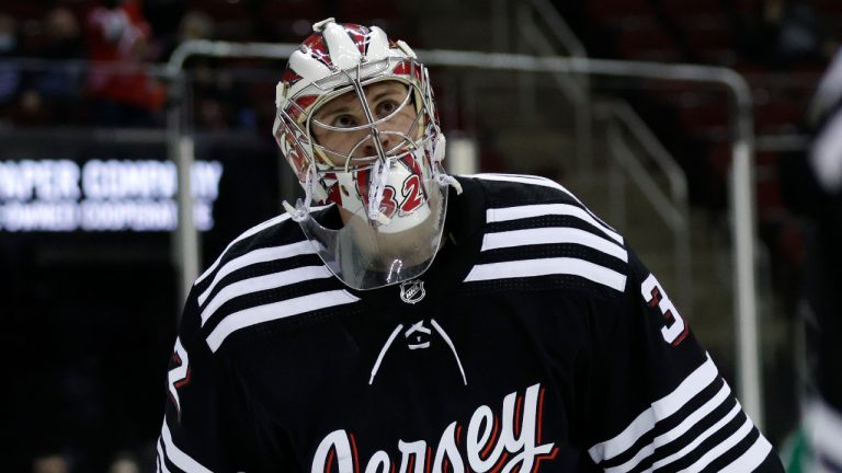 Former New Jersey Devils goaltender Jon Gillies skates off the ice after losing to the Dallas Stars in an NHL hockey game Tuesday, Jan. 25, 2022, in Newark, N.J. The Stars won 5-1. (Adam Hunger/AP) 