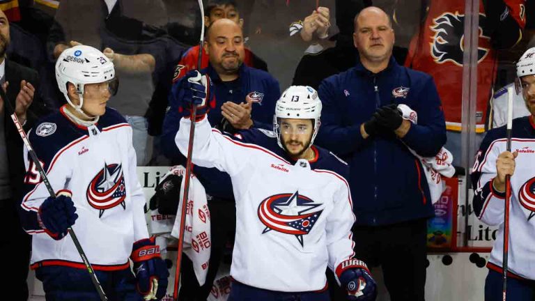 Columbus Blue Jackets forward Johnny Gaudreau, centre, waves to fans on his return to Calgary during first period NHL hockey action against the Calgary Flames in Calgary, Monday, Jan. 23, 2023. (Jeff McIntosh/CP)