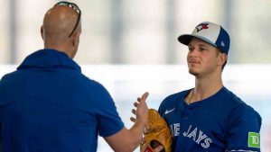 Toronto Blue Jays pitcher Adam Macko talks with pitching coach Pete Walker during Spring Training action in Dunedin, Fla. on Friday February 23, 2024. (Frank Gunn/CP)