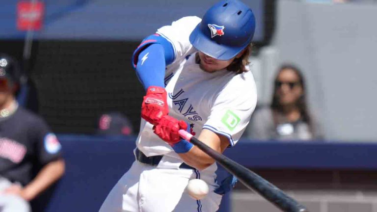 Toronto Blue Jays third base Addison Barger (47) hits a single against the Cleveland Guardians during second inning MLB baseball action in Toronto on Saturday, June 15, 2024. (Chris Young/CP)