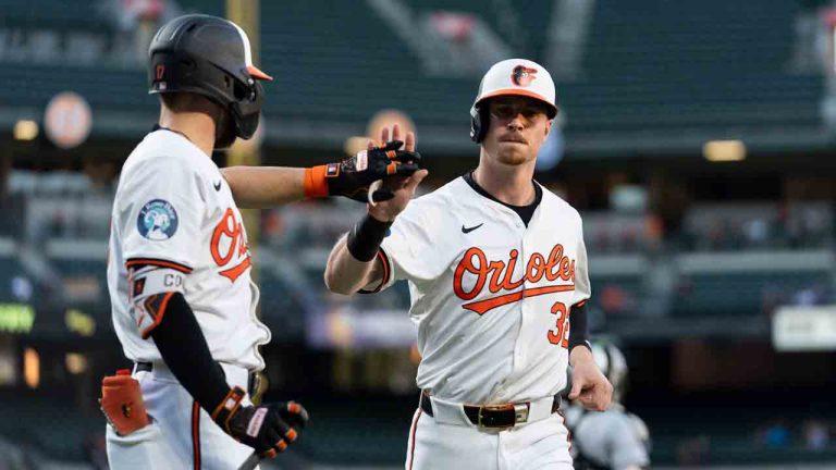 Baltimore Orioles' Ryan O'Hearn celebrates with Colton Cowser, left, after scoring on an RBI double hit in by Anthony Santander during the first inning of a baseball game against the Chicago White Sox, Tuesday, Sept. 3, 2024, in Baltimore. (Stephanie Scarbrough/AP)