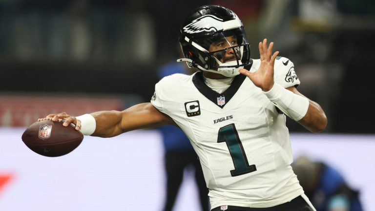 Philadelphia Eagles quarterback Jalen Hurts (1) passes against the Green Bay Packers during the first half of an NFL football game, Friday, Sept. 6, 2024, at the Neo Quimica Arena in Sao Paulo. (AP Photo/Gregory Payan) 