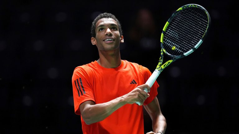 Canada's Felix Auger Aliassime celebrates after defeating Finland's Otto Virtanen during a Davis Cup tennis match in Manchester, England, Thursday, Sept. 12, 2024. (Martin Rickett/PA via AP) 