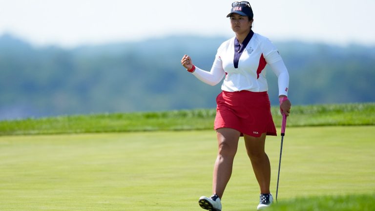 United States' Lilia Vu reacts after making a putt on the 17th green during a Solheim Cup golf tournament singles match at the Robert Trent Jones Golf Club, Sunday, Sept. 15, 2024, in Gainesville, Va. (Chris Szagola/AP) 