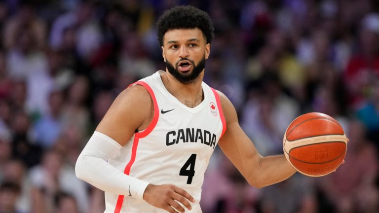 Canada's Jamal Murray dribbles in a men's basketball game against Australia at the 2024 Summer Olympics, Tuesday, July 30, 2024, in Villeneuve-d'Ascq, France. (Michael Conroy/AP) 