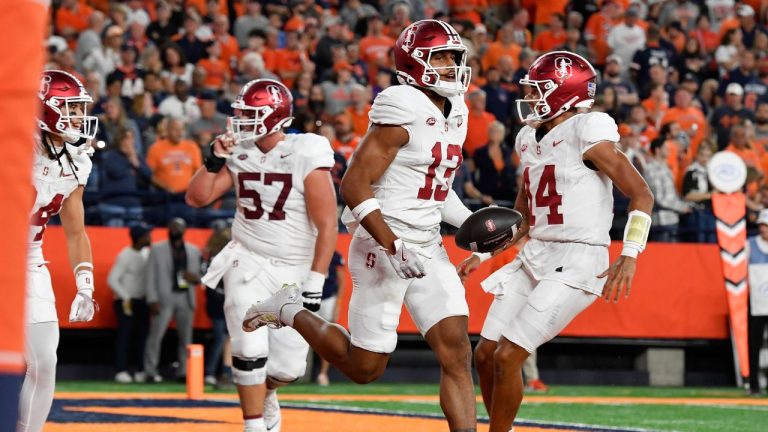 Stanford wide receiver Elic Ayomanor celebrates with linebacker Ernest Cooper after scoring during the first half of an NCAA football game against Syracuse on Friday, Sept. 20, 2024 in Syracuse, N.Y. (Adrian Kraus/AP Photo)