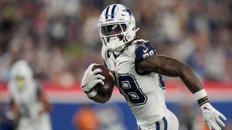 Dallas Cowboys wide receiver CeeDee Lamb (88) runs for a touchdown against the New York Giants during the second quarter of an NFL football game, Thursday, Sept. 26, 2024, in East Rutherford, N.J. (Bryan Woolston/AP)