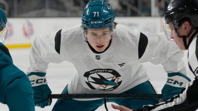 San Jose Sharks' Macklin Celebrini takes part in a scrimmage at the NHL hockey team's practice facility in San Jose, Calif., Thursday, Sept. 19, 2024. (AP Photo/Jeff Chiu)