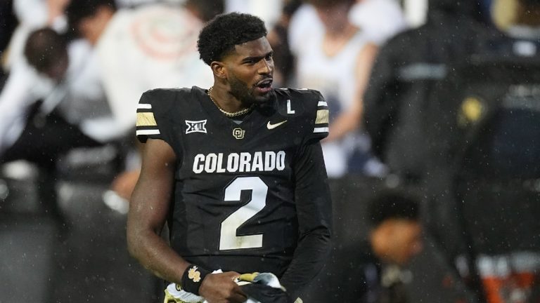 Colorado quarterback Shedeur Sanders celebrates after an overtime victory over Baylor in an NCAA college football game Saturday, Sept. 21, 2024, in Boulder, Colo. (David Zalubowski/AP)