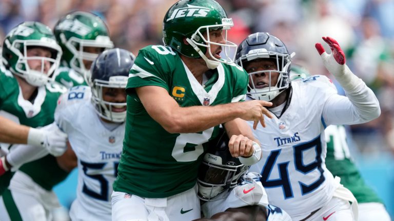 New York Jets quarterback Aaron Rodgers (8) sees pressure from Tennessee Titans defense in the first half of an NFL football game in Nashville, Tenn., on Sunday, Sept. 15, 2024. (George Walker IV/AP)