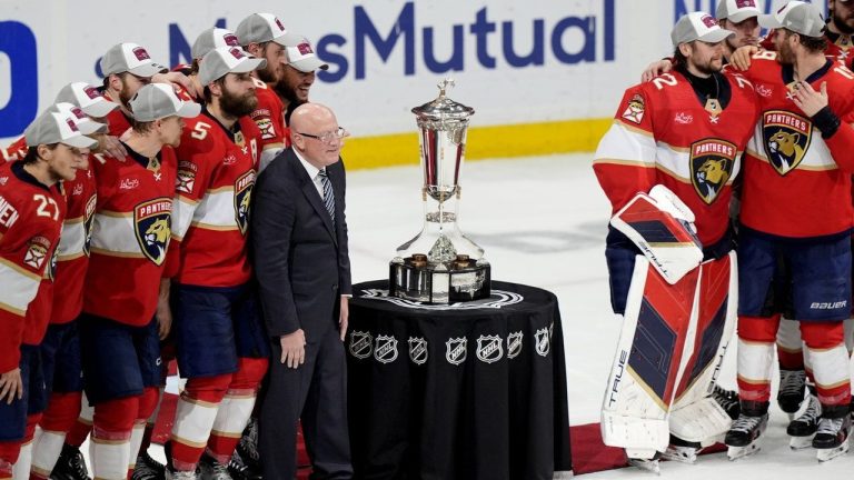 Bill Daly, deputy commissioner of the NHL, center left, poses with the Florida Panthers and the Prince of Wales Trophy after after the Panthers defeated the New York Rangers in Game 6 to win the Eastern Conference finals, Saturday, June 1, 2024, in Sunrise, Fla. (Lynne Sladky/AP)