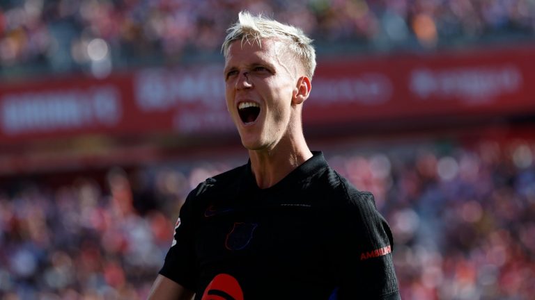 Barcelona's Dani Olmo celebrates after scoring his side's third goal during the Spanish La Liga soccer match between Girona and Barcelona at the Montilivi stadium in Girona, Spain, Sunday, Sept. 15, 2024. (AP/Joan Monfort)