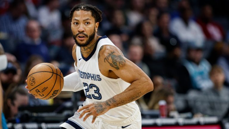 Former Memphis Grizzlies guard Derrick Rose drives to the basket against the Charlotte Hornets during the first half of an NBA basketball game in Charlotte, N.C., Saturday, Feb. 10, 2024. (AP Photo/Nell Redmond)