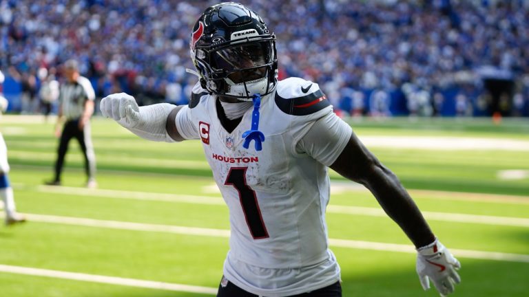 Houston Texans wide receiver Stefon Diggs (1) celebrates a touchdown during the second half of an NFL football game against the Indianapolis Colts, Sunday, Sept. 8, 2024, in Indianapolis. (Darron Cummings/AP)