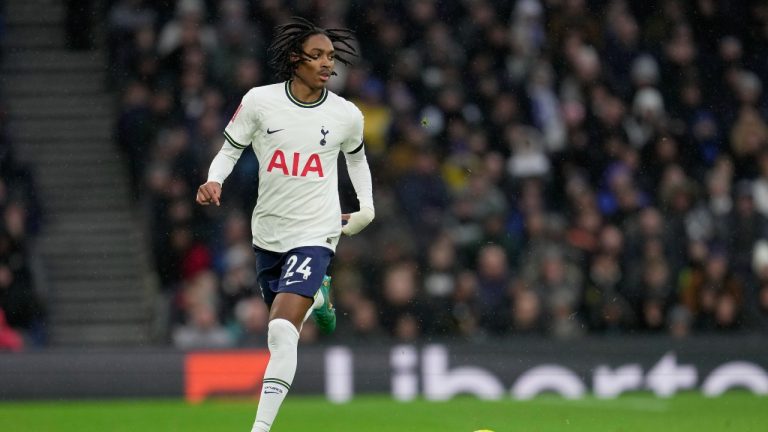 Tottenham's Djed Spence controls the ball during the English FA Cup soccer match between Tottenham Hotspur and Portsmouth at Tottenham Hotspur Stadium in London, Saturday, Jan. 7, 2023. (AP/Kin Cheung)