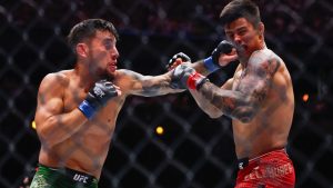 Esteban Ribovics, left, fights Daniel Zellhuber in a lightweight bout during UFC 306 at the Sphere, Saturday, Sept. 14, 2024, in Las Vegas. (Wade Vandervort/Las Vegas Sun via AP)