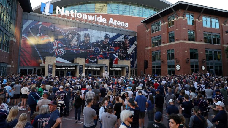 Fans gather for a candlelight vigil to honor Columbus Blue Jackets hockey player Johnny Gaudreau, outside of Nationwide Arena in Columbus, Ohio, Thursday, Sept. 4, 2024. Gaudreau and his brother Matthew were killed by a motor vehicle last week while riding bicycles. (Joe Maiorana/AP)