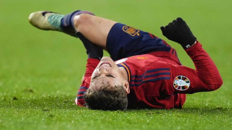 Spain's Gavi Paez reacts after injuring his leg during the Euro 2024 group A qualifying soccer match between Spain and Georgia at Jose Zorrilla Stadium in Valladolid, Spain, Nov. 19 23, 2023. (Manu Fernandez/AP Photo)
