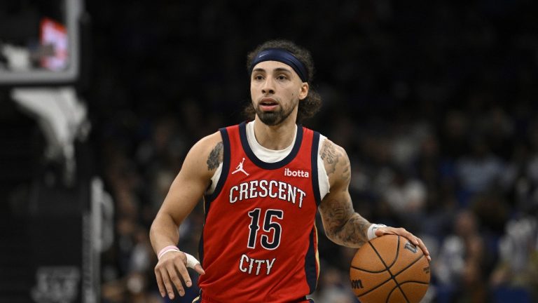 New Orleans Pelicans guard Jose Alvarado (15) brings the ball up the court during the second half of an NBA basketball game against the Orlando Magic, Thursday, March 21, 2024, in Orlando, Fla. (AP Photo/Phelan M. Ebenhack)