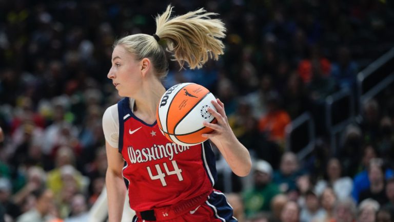 Washington Mystics guard Karlie Samuelson moves the ball during a WNBA basketball game against the Seattle Storm, Saturday, May 25, 2024, in Seattle. (Lindsey Wasson/AP)