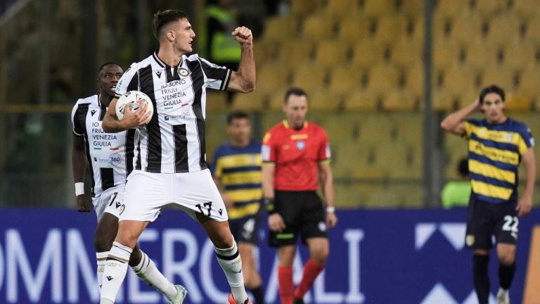 Udinese's Lorenzo Lucca, front, celebrates after scoring his side's first goal during the Serie A soccer match between Parma and Udinese in Parma, Italy, Monday Sept. 16, 2024 (Massimo Paolone/LaPresse via AP)