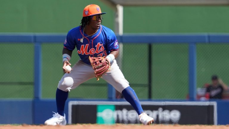 New York Mets second baseman Luisangel Acuna throws to first during the second inning of a spring training baseball game against the Washington Nationals Monday, Feb. 26, 2024, in West Palm Beach, Fla. (AP/Jeff Roberson)