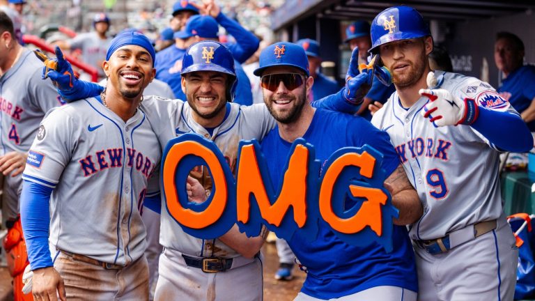 New York Mets' Francisco Lindor, left, Jose Iglesias, left center, David Peterson, right center, and Brandon Nimmo, right, celebrate in the dugout after taking the lead in the eighth inning of a baseball game against the Atlanta Braves, Monday, Sept. 30, 2024, in Atlanta. (Jason Allen/AP)