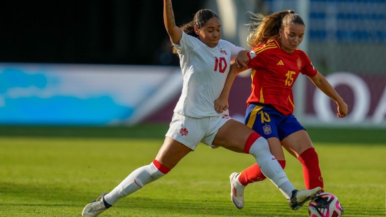 Canada's Olivia Smith, left, and Spain's Sara Ortega vie for control of the ball during a U-20 Women's World Cup round of sixteen soccer match in Cali, Colombia, Wednesday, Sept 11, 2024. (CP/AP-Dolores Ochoa)