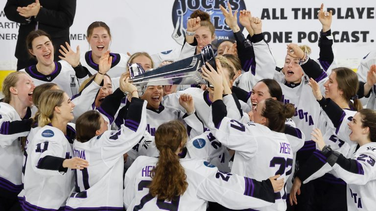 Minnesota players celebrate with the Walter Cup after defeating Boston to win the PWHL Walter Cup, Wednesday May 29, 2024, in Lowell, Mass. (Mary Schwalm/AP)