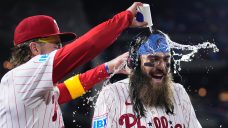 Phillies beat Cubs, clinch first-round bye in playoffs