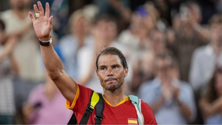 Rafael Nadal reacts waves after the men's doubles quarter-final tennis competition at the Roland Garros stadium, at the 2024 Summer Olympics, July 31, 2024, in Paris, France. (Manu Fernandez/AP Photo)
