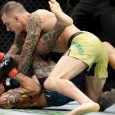 Renato-Moicano,-top,-hits-Cub-Swanson-during-their-featherweight-mixed-martial-arts-bout-at-UFC-227-in-Los-Angeles-in-2018.